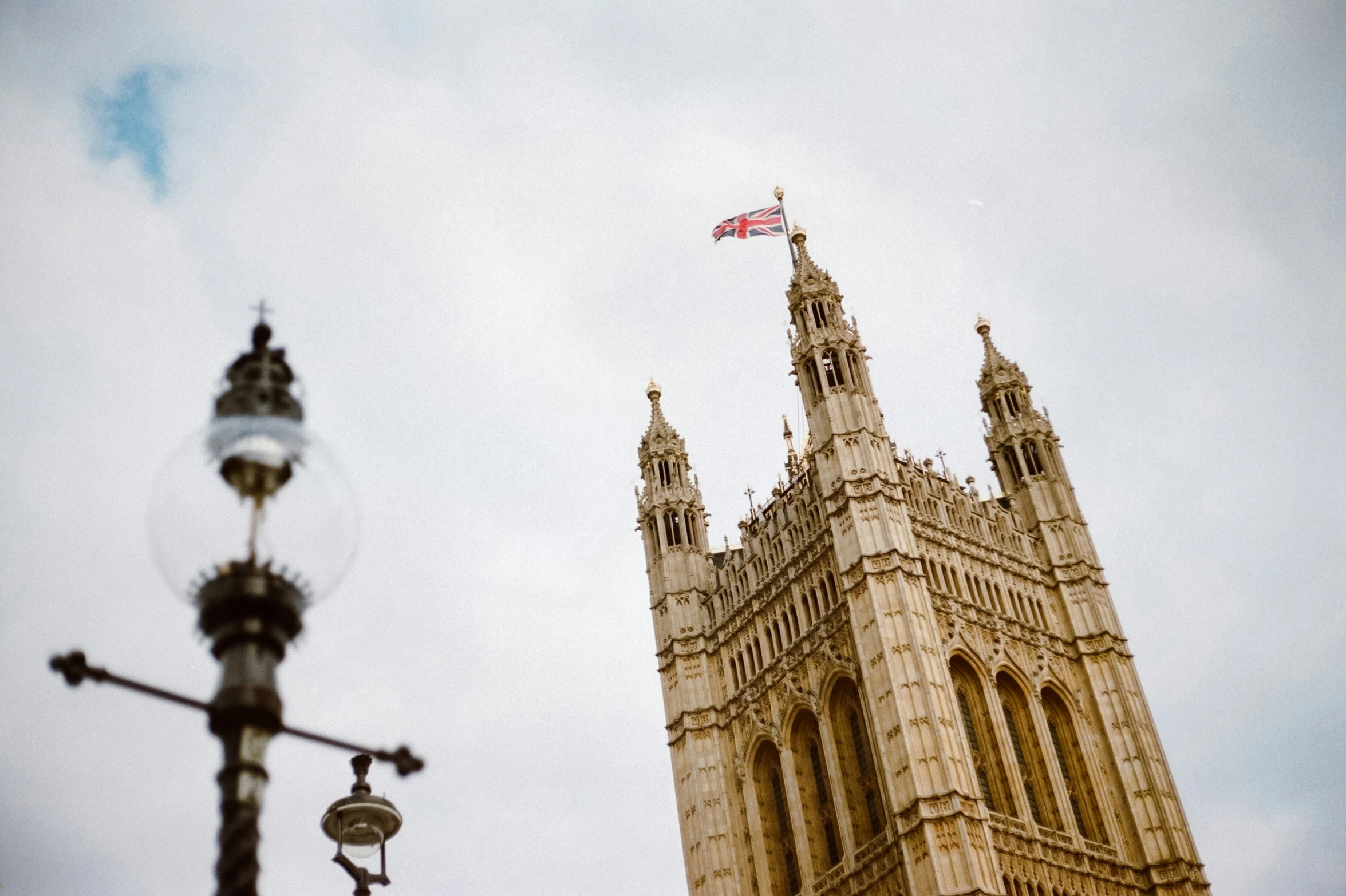 a closeup of the flag flying on top of big ben