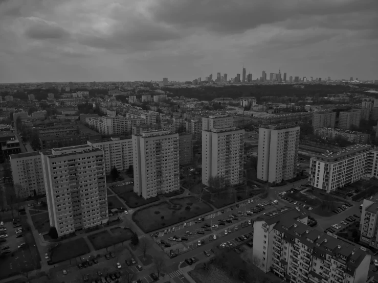 a black and white po of city life in the rain