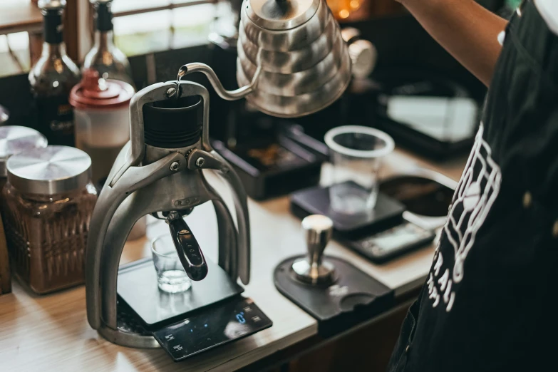 the coffee maker is turning one cup up