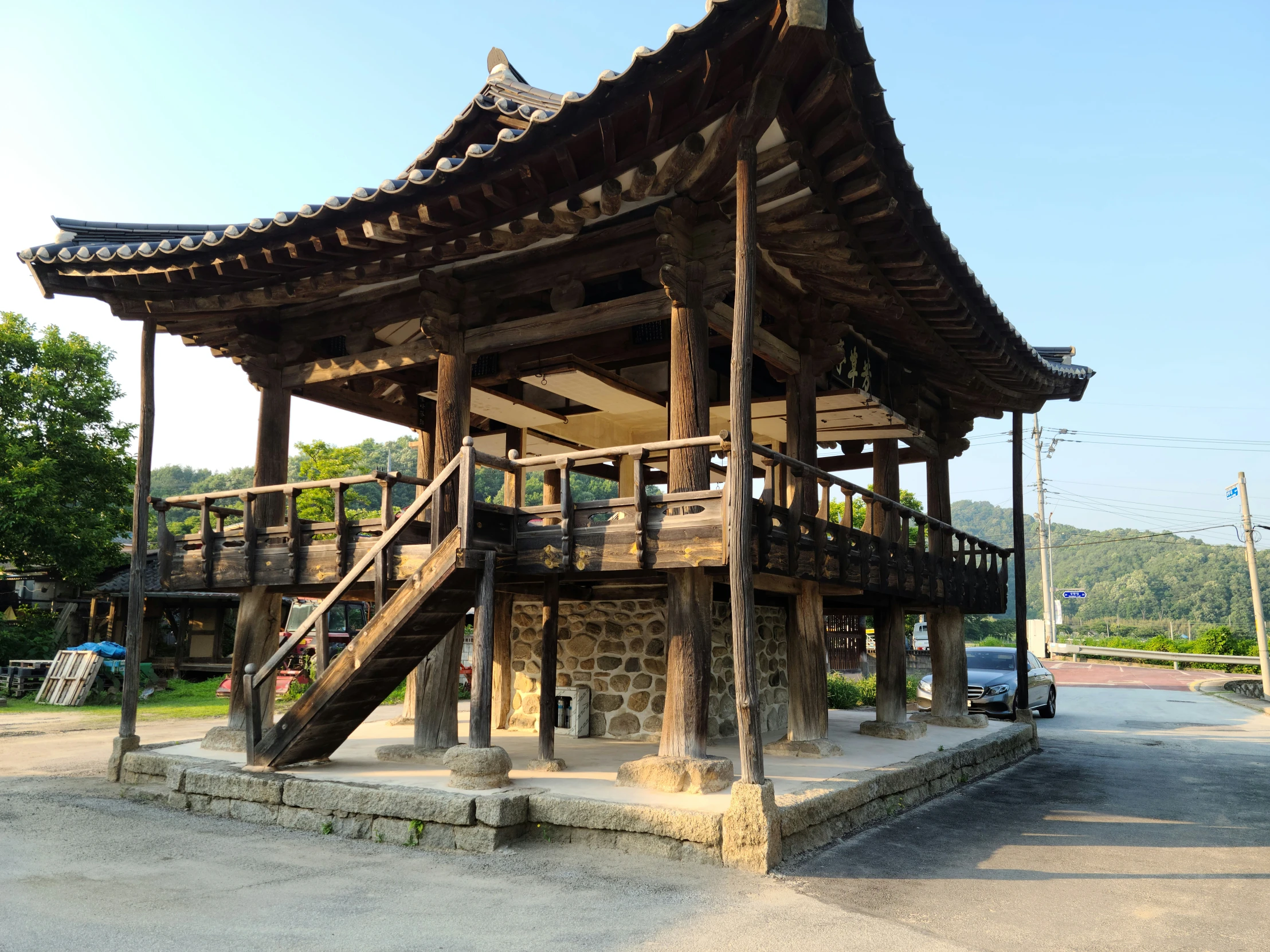 a wooden structure with stairs up to the top