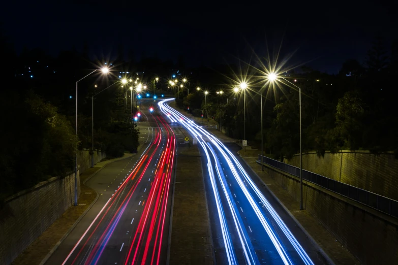 night time view of the city from a high bridge