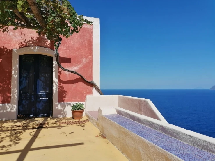 a door that is inside of a building near the ocean