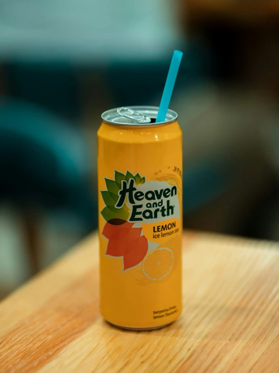 an orange and yellow drink sitting on top of a table