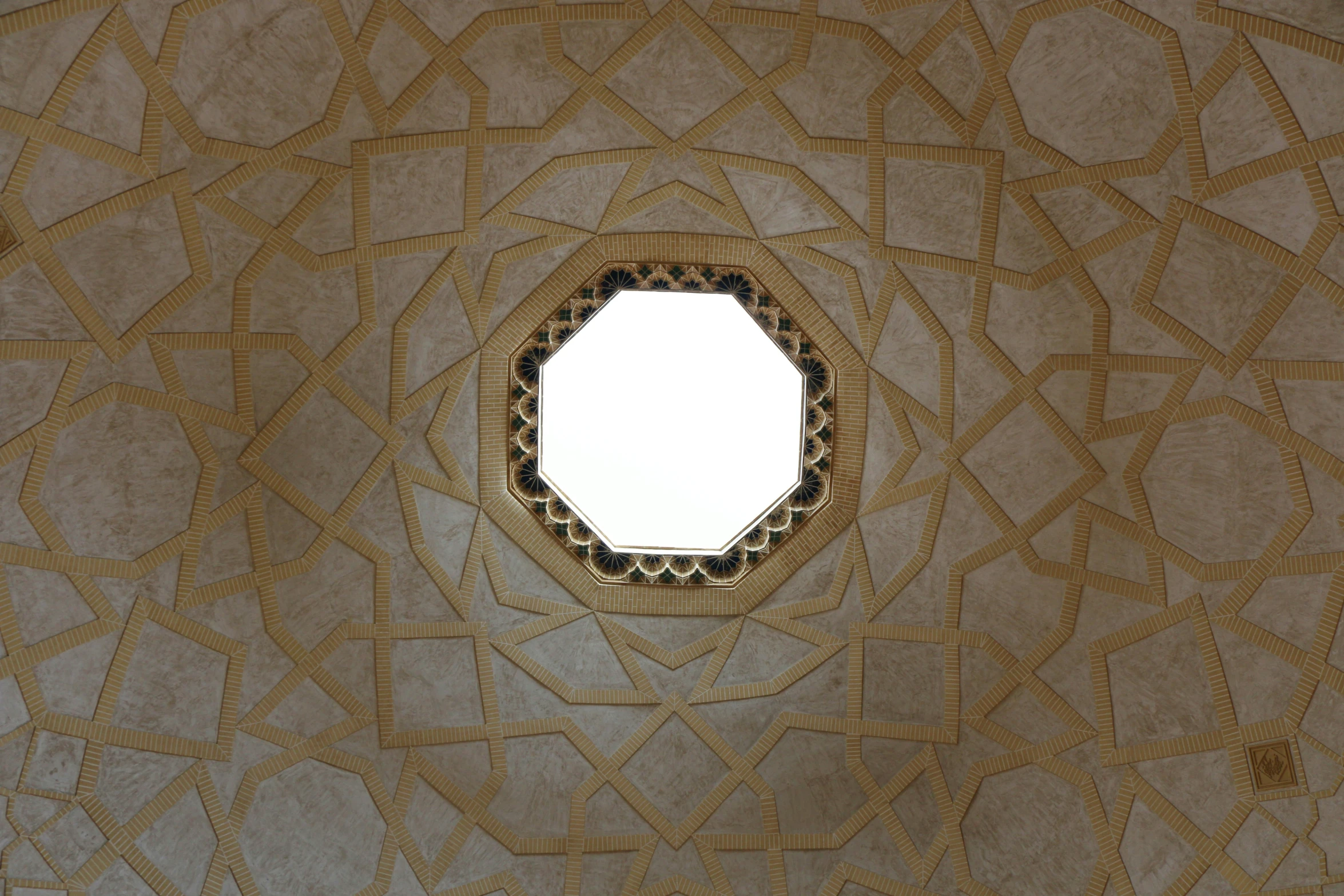 the ceiling of a structure with geometric patterns is made up