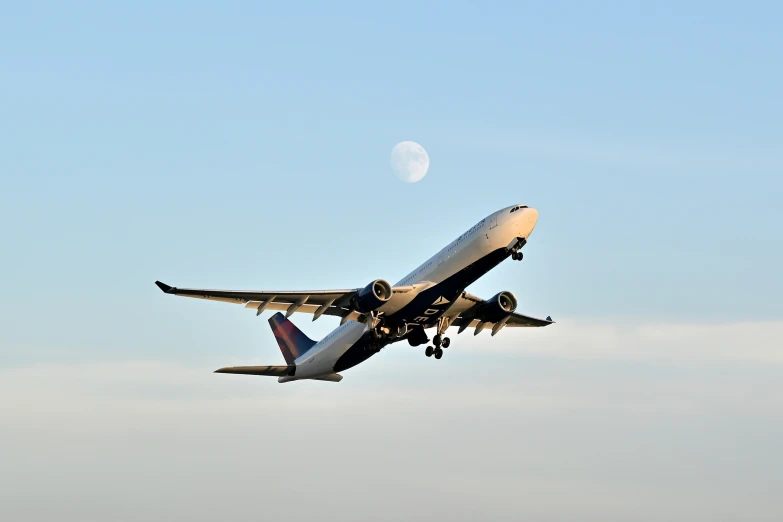 a large jetliner flying through the air