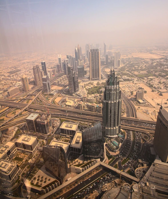 the top of a very tall building in a big city