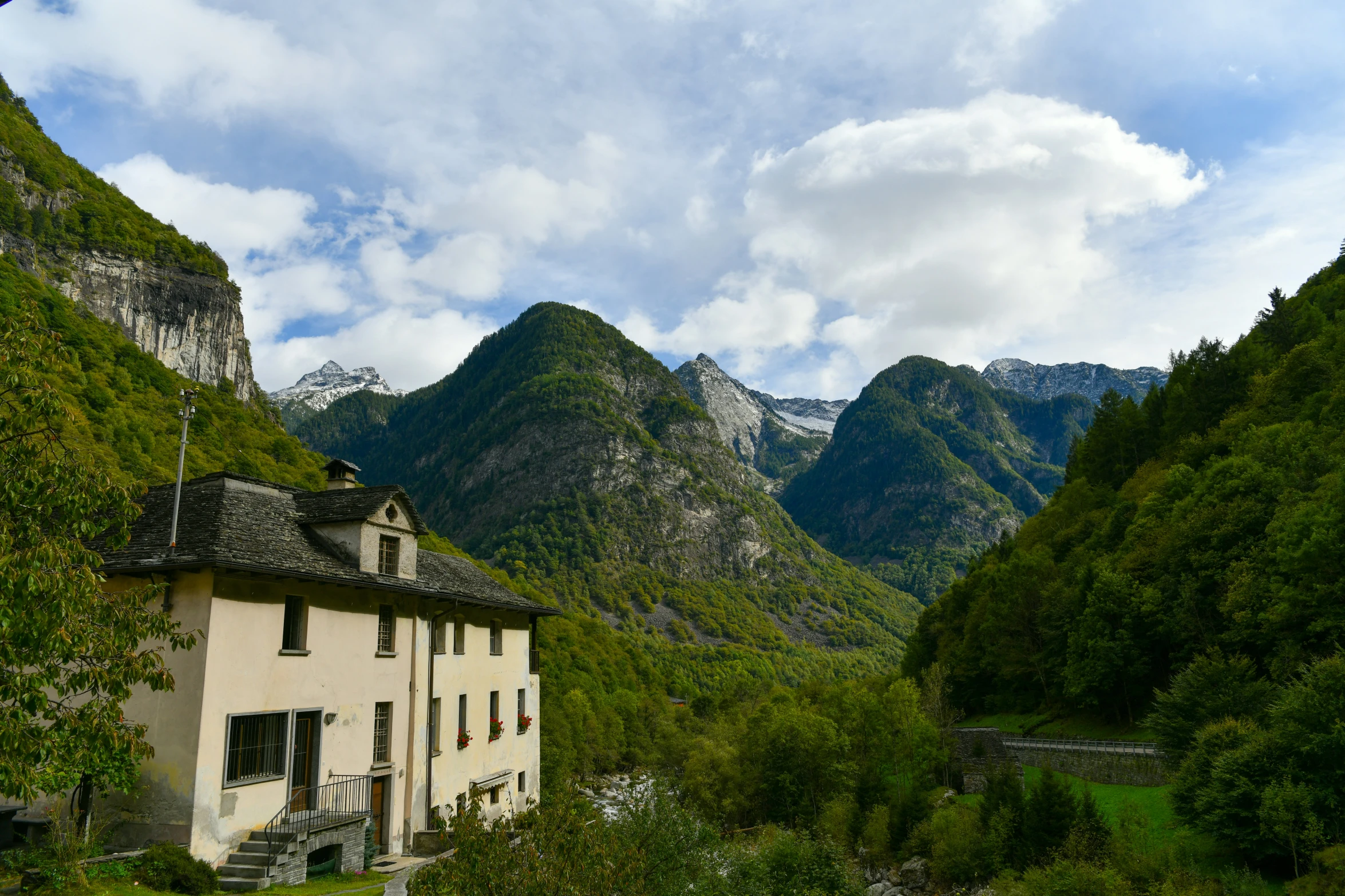 this is an image of a house and mountains