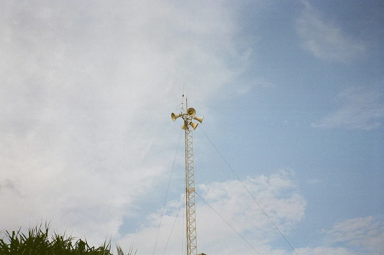 two tall white towers under a blue sky