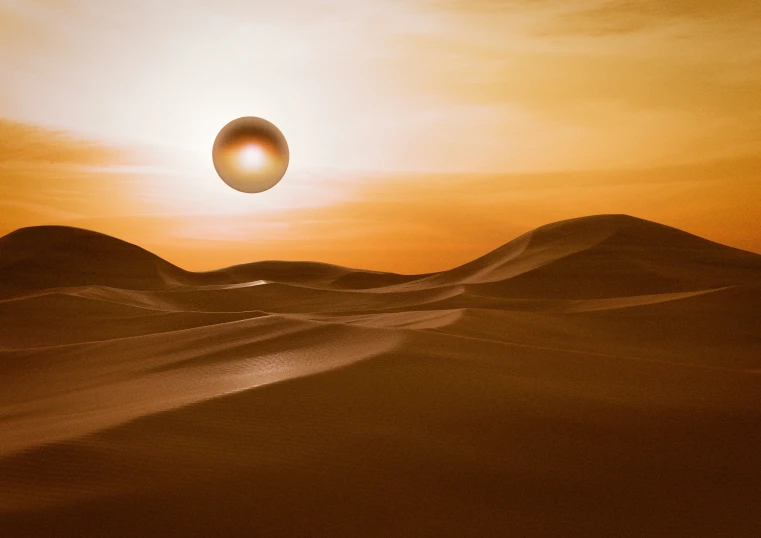 an object flying through the air over sand dunes