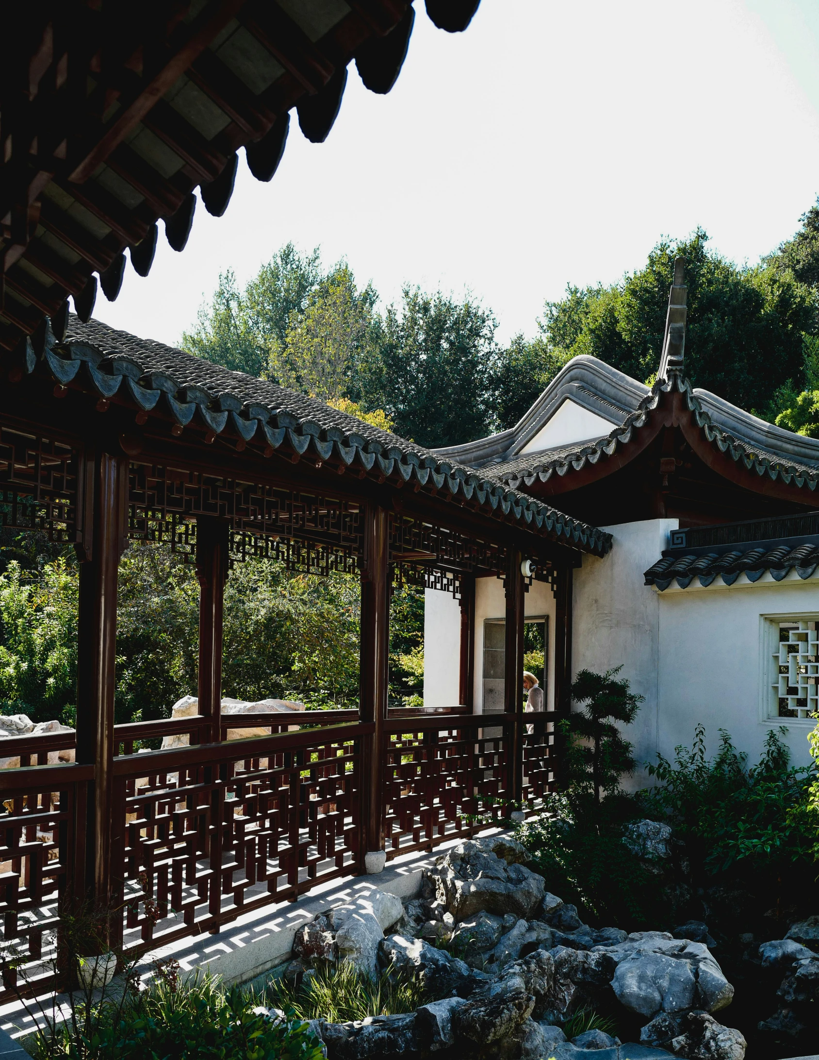 a view of an outdoor area with an oriental roof and pavilion