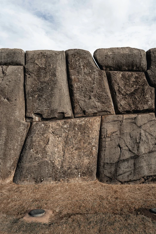 some very large stone bricks stacked together