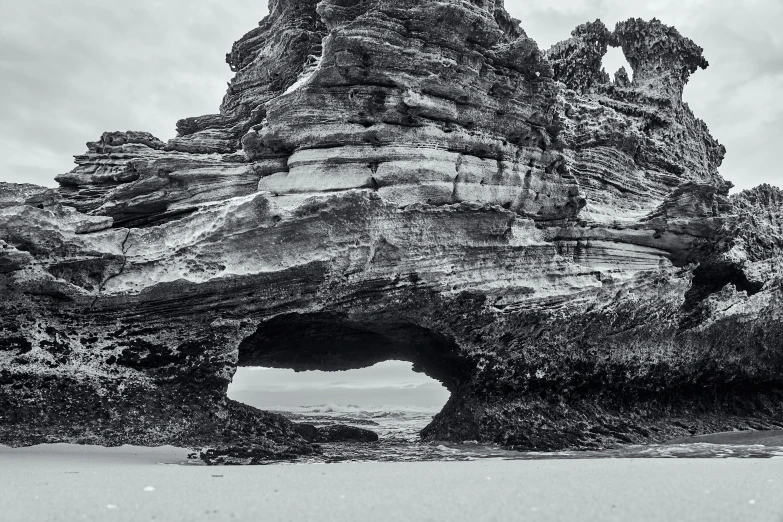 this is an old rock formation by the ocean