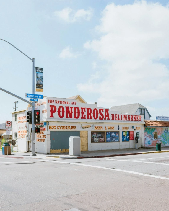 an intersection with a store called ponderosa del marr in the corner