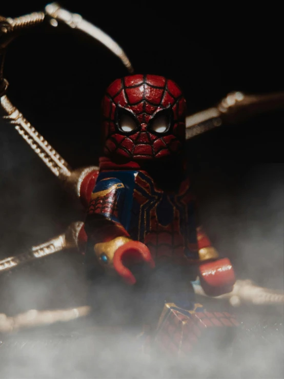 this is a spider man figurine in costume