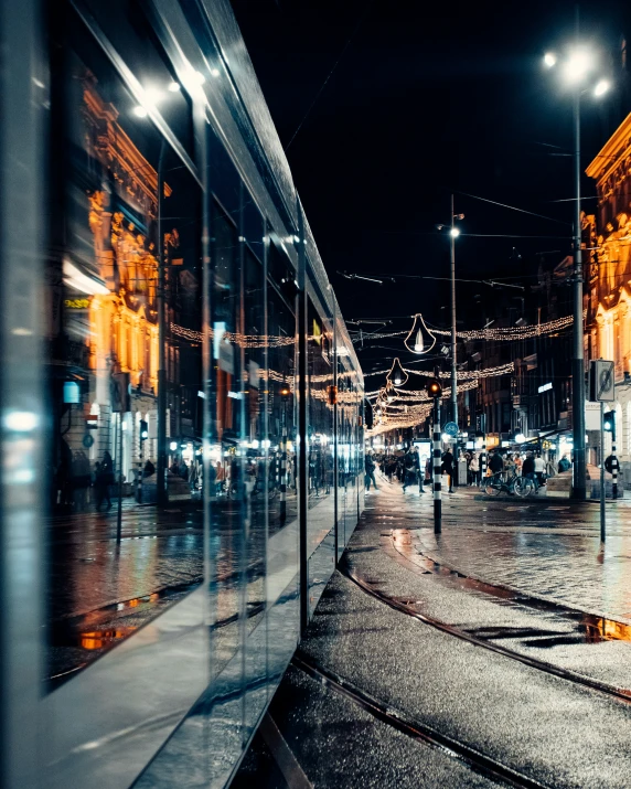 a city street at night with a lot of traffic