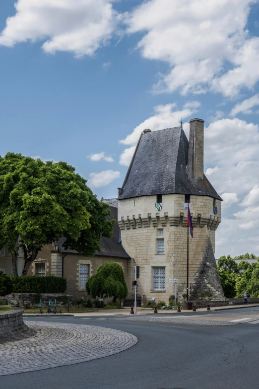 a tall house with a very pointed roof