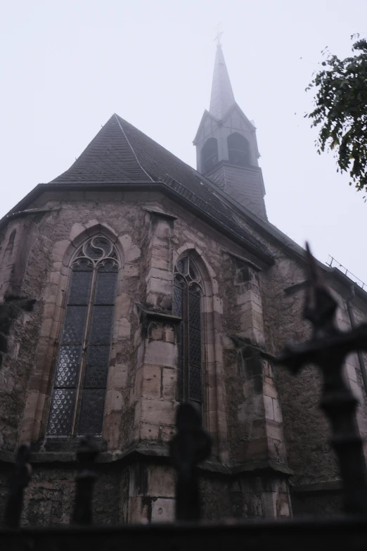 an old church that has spires on top of it