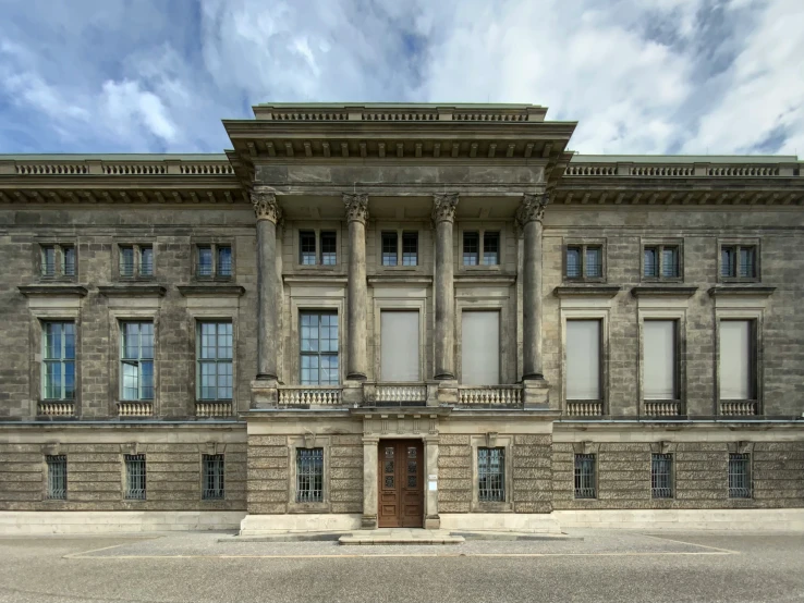 old building with pillars and columns and doors