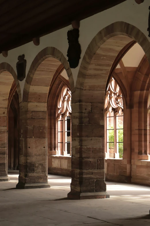 stone pillars and arched windows in an old building