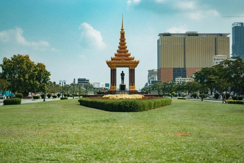 a tall tower in the middle of a park
