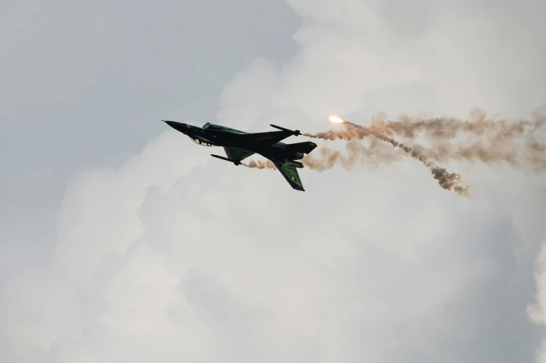 two airplanes flying side by side in the air