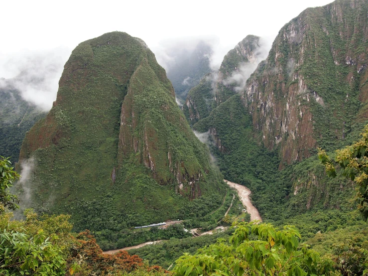 several mountains that have lush green vegetation on them