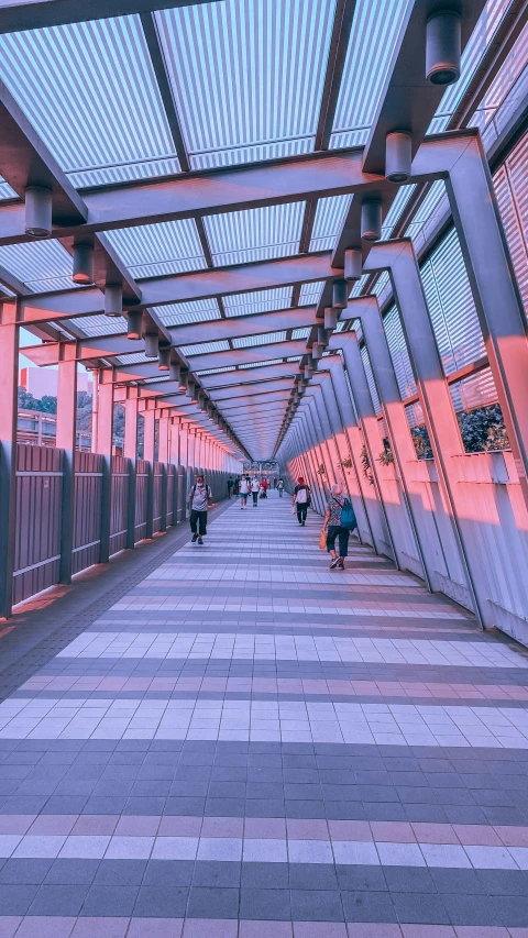 a walkway is seen through a metal structure