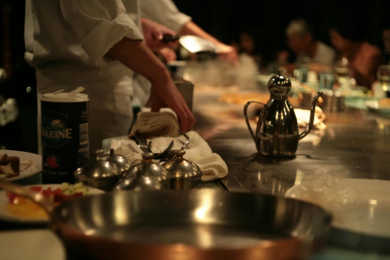 a cook prepares food at a restaurant's kitchen