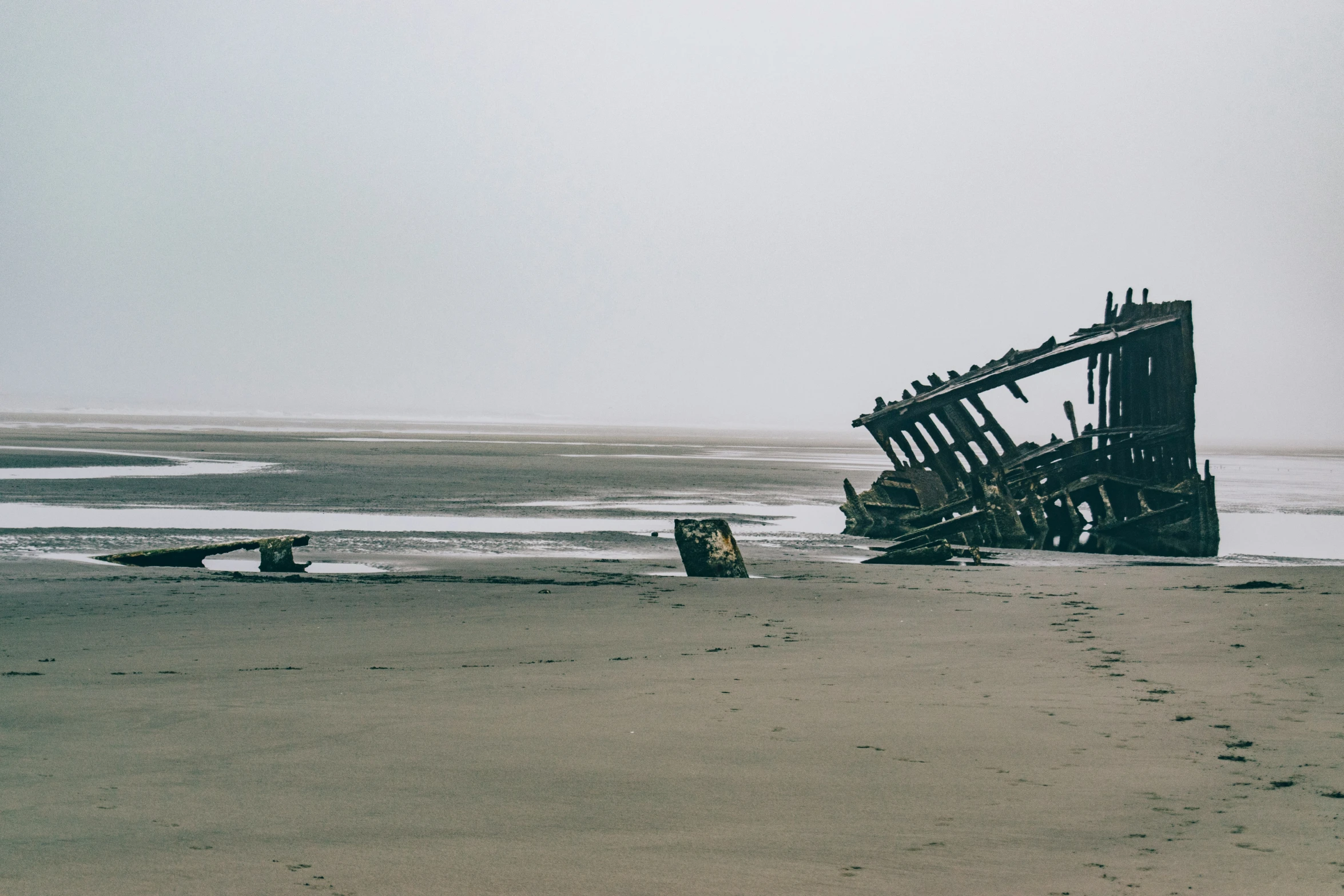 the remains of the boat on the beach