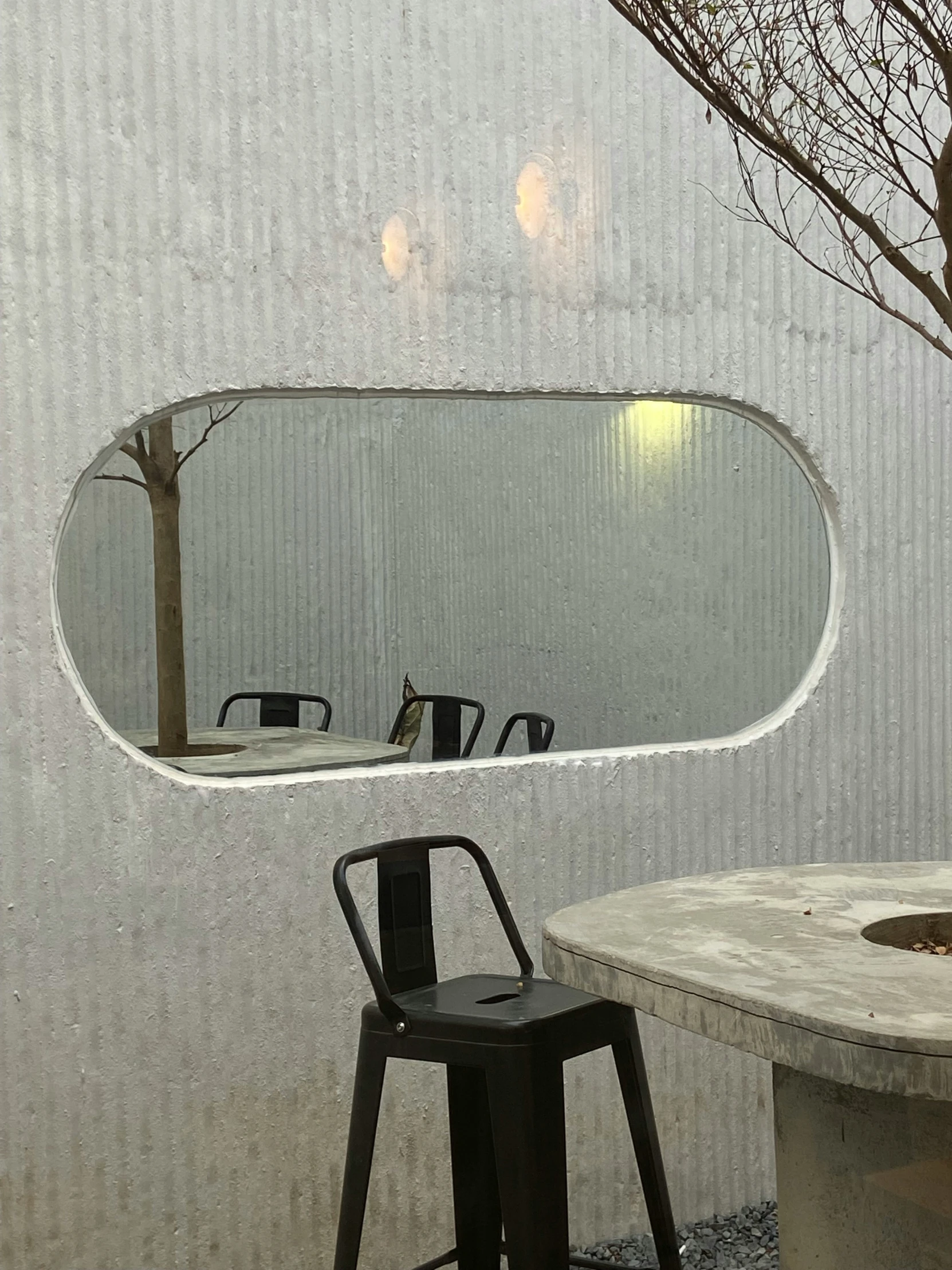 there is a large mirror in the middle of a room