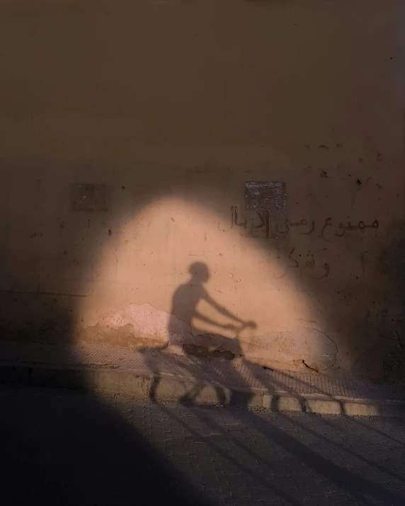 a man is riding his bike down the street