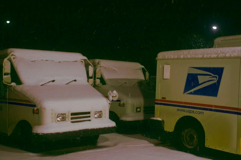 an image of a mail truck in the snow
