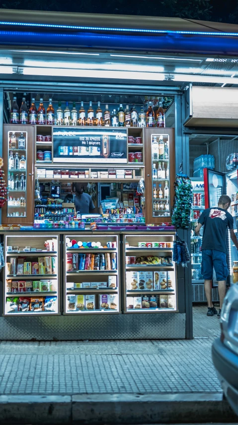 a large open air bar near a store front