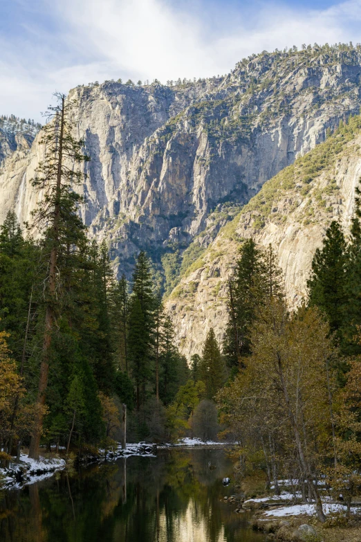 a mountain with a lake near by in the mountains