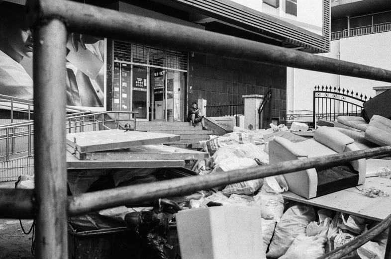 black and white po of garbage in city street