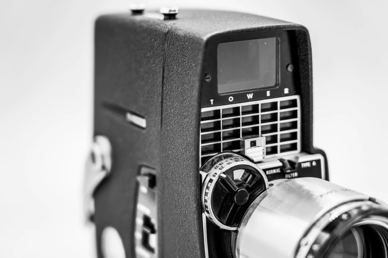 an old fashioned portable radio with the lens in front