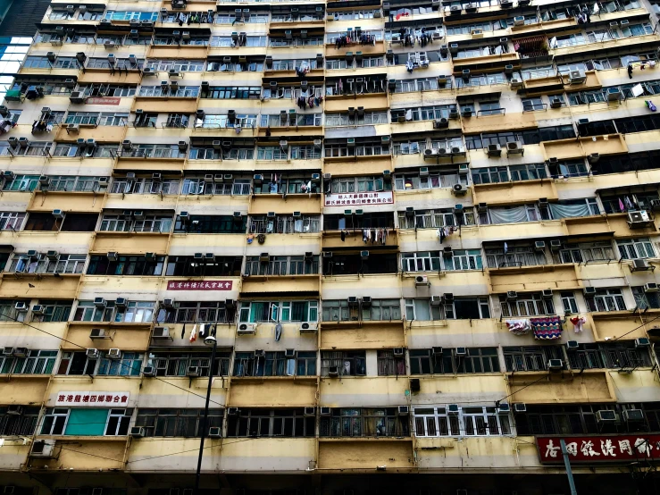 a building with many balconies and windows in the middle of it