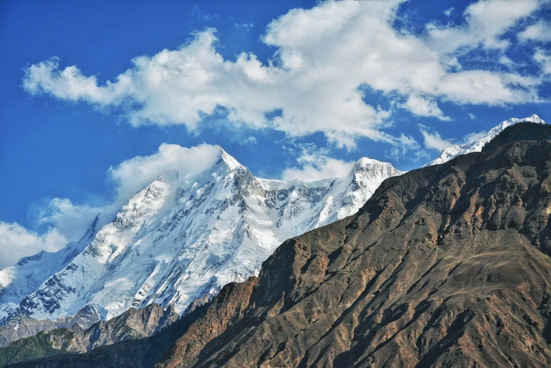 the mountains and the clouds are beautiful