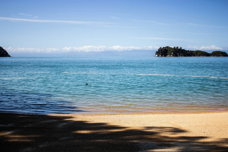 the sun shines on the water in the ocean