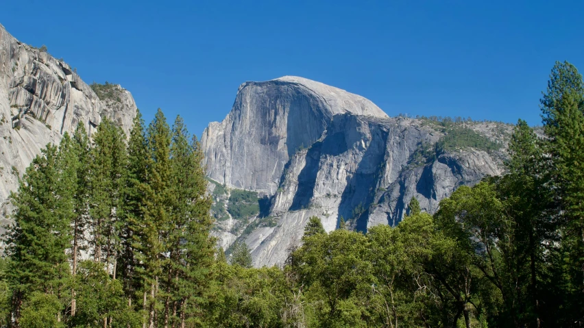 a large rock sticking out from the ground