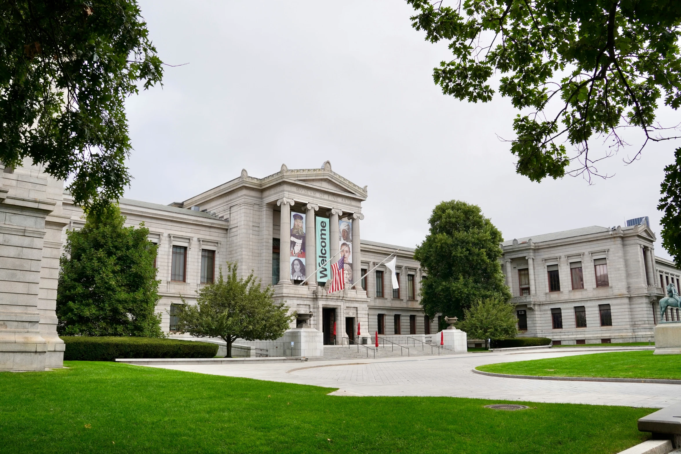 a large white building that has a giant banner on it