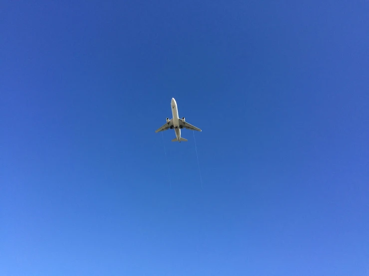 a small airplane is flying in the sky