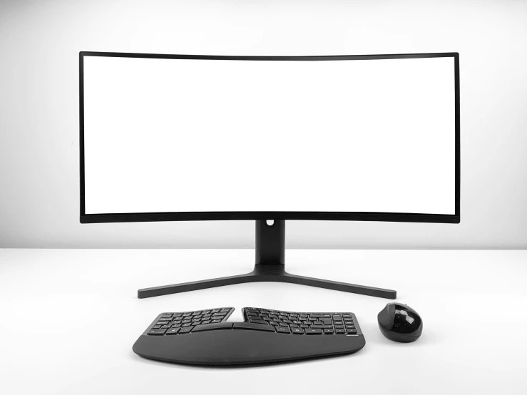 a keyboard and a mouse are sitting next to a monitor