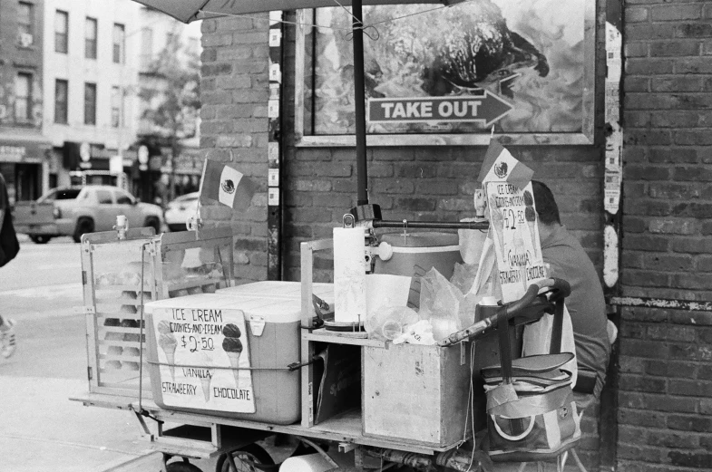 an old black and white po shows the side of a business