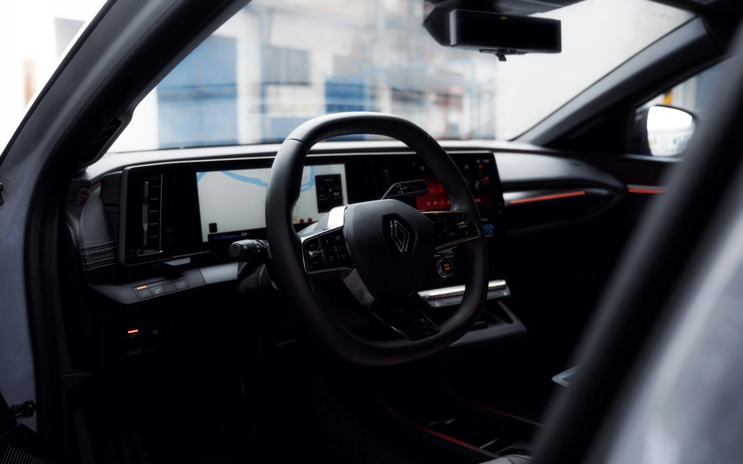 inside of a car, dash light, dashboard, and steering wheel