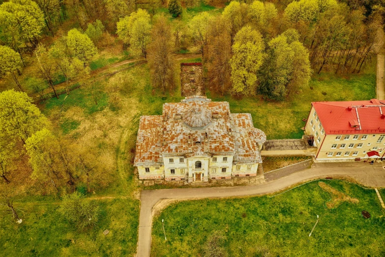 an aerial view shows a church with two rooms and a garden
