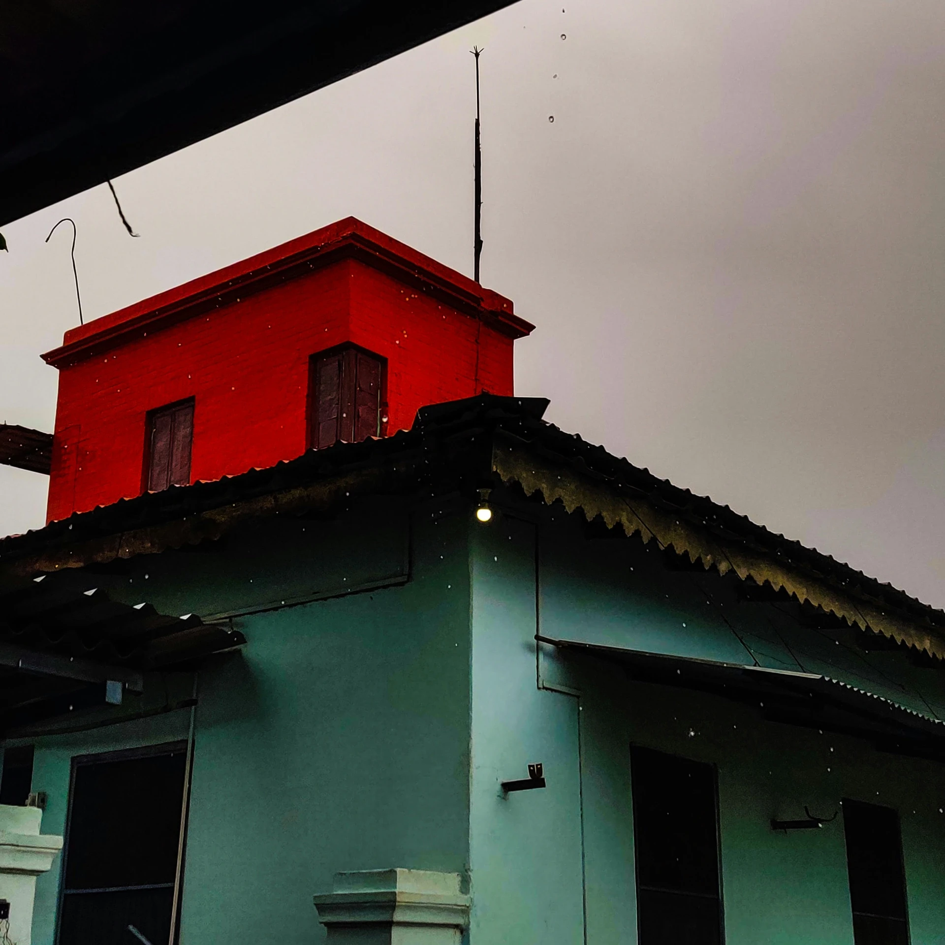 a red tower in the middle of a building