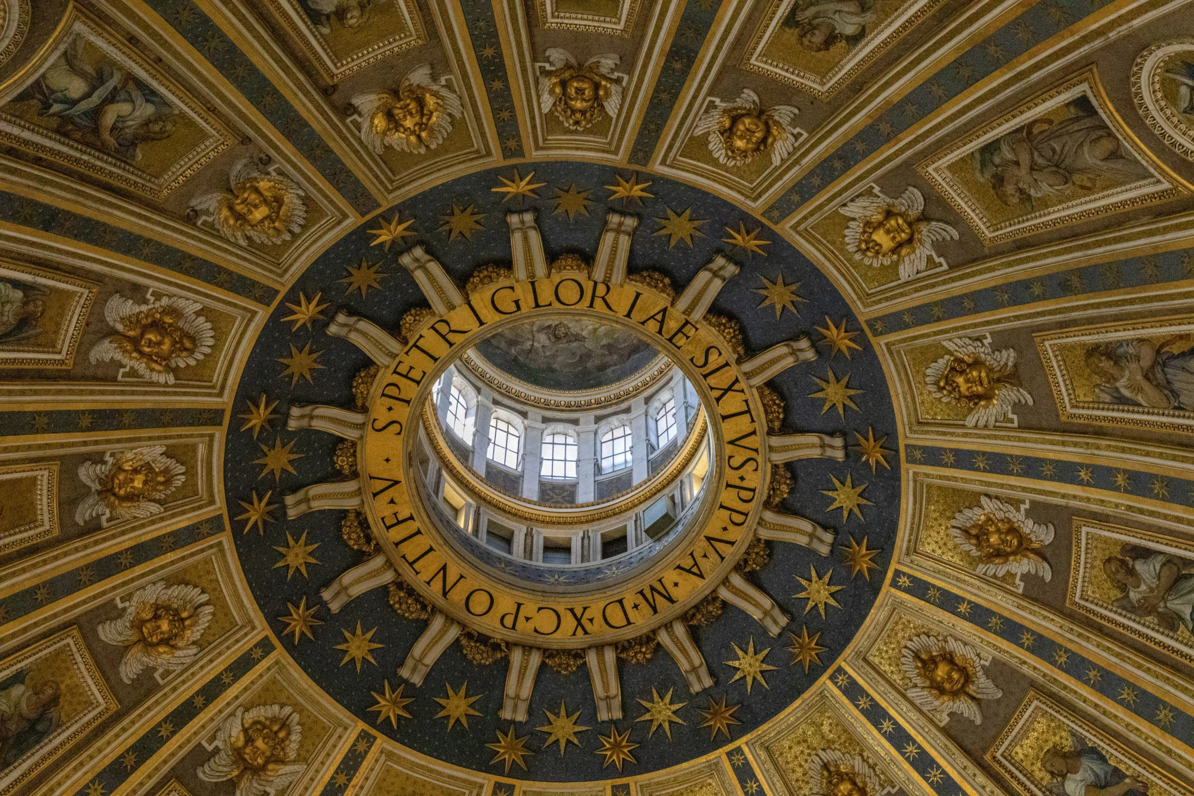 a view from the inside looking up at a dome