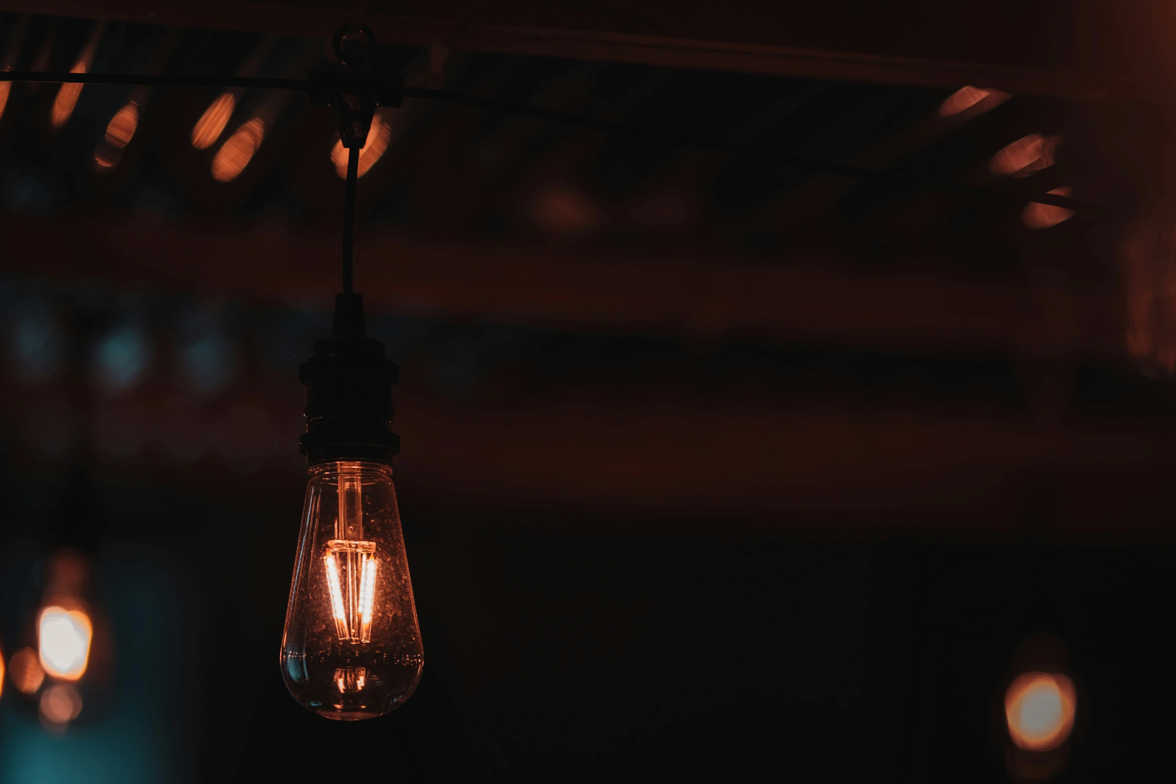 a light that is hanging from a cable