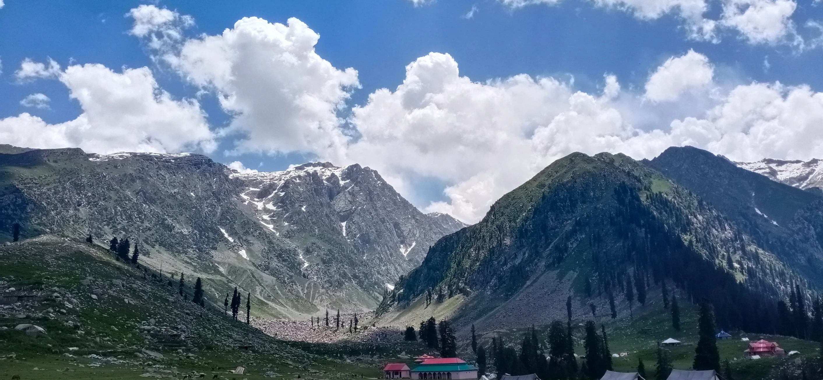 the village sits in front of some mountains